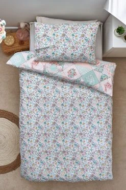 Next Rainbow Patchwork Design With Poms 100% Cotton Duvet Cover And Pillowcase Set 13 Next Rainbow Patchwork Design With Poms 100% Cotton Duvet Cover And Pillowcase Set -Furn Online C21 694s3